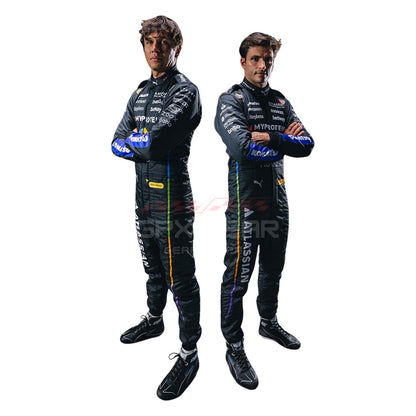 Two individuals, Alexander Albon and Carlos Sainz, wearing black 2025 Williams Las Vegas GP racing suits with sponsor logos - GPX WEAR