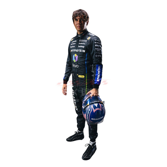 Alexander Albon wearing a black 2025 Williams Las Vegas GP F1 racing suit, holding a helmet - GPX WEAR