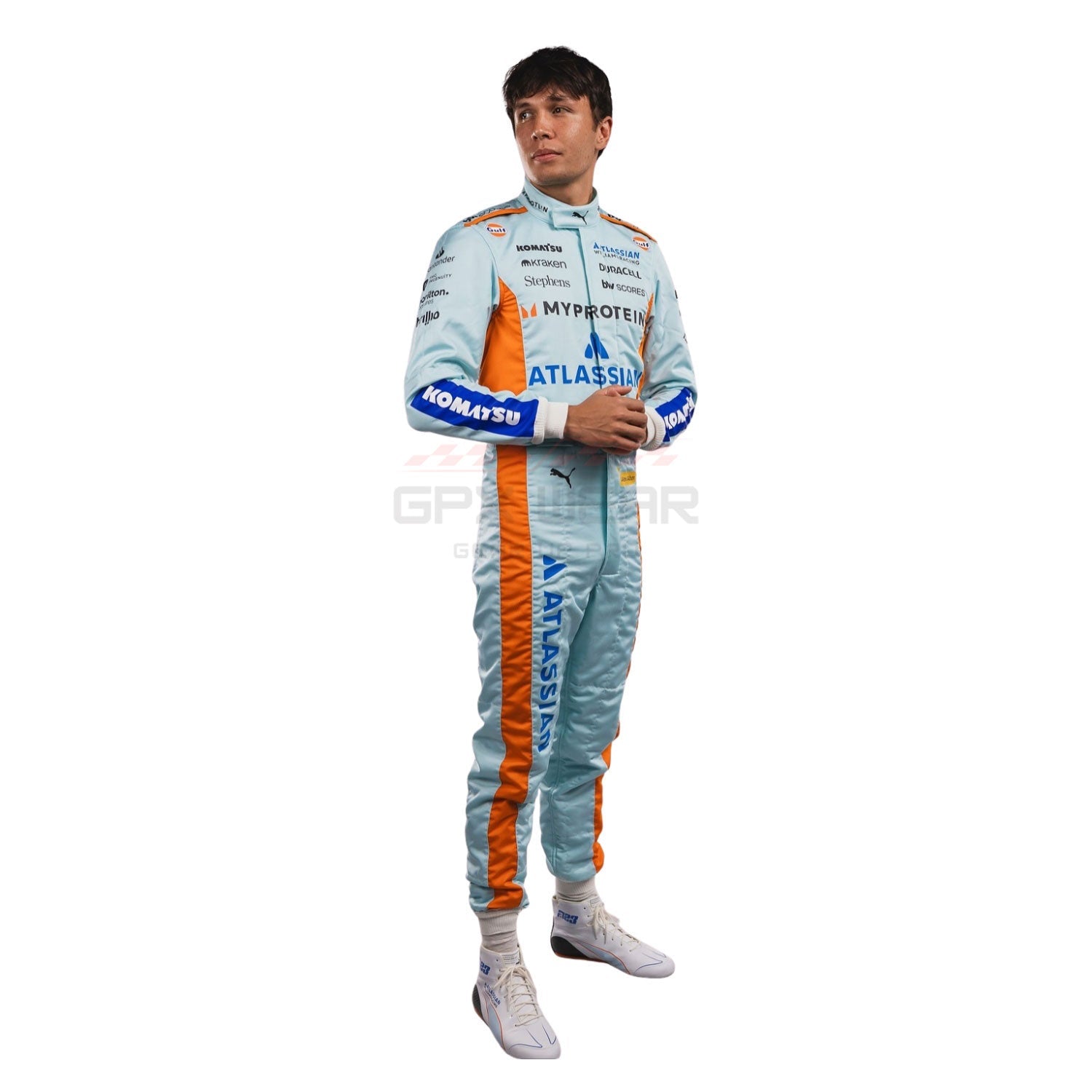 Alexander Albon wearing a light blue 2025 Williams Sao Paul GP F1 racing suit with orange accents - GPX WEAR