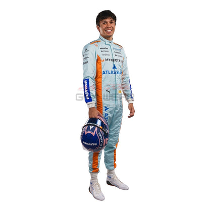 Alexander Albon wearing a light blue 2025 Williams Sao Paul GP F1 racing suit with various sponsor logos - GPX WEAR