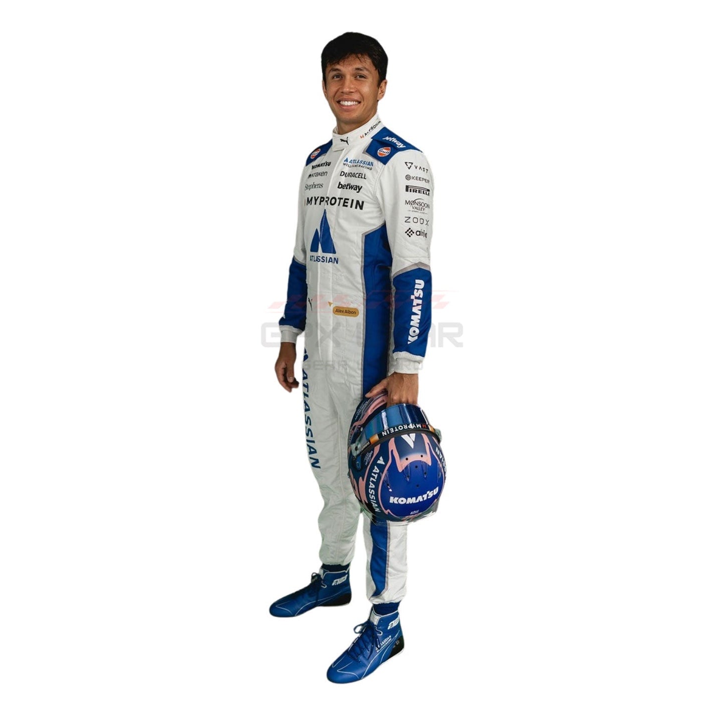 Carlos Sainz, wearing a white and blue 2025 Williams United States GP F1 racing suit, holding a helmet - GPX WEAR