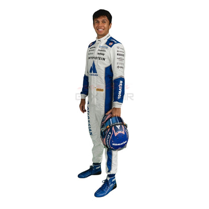 Carlos Sainz, wearing a white and blue 2025 Williams United States GP F1 racing suit, holding a helmet - GPX WEAR