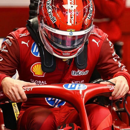 Charles Leclerc wearing a red 2025 Ferrari Las Vegas GP F1 racing suit with various sponsor logos - GPX WEAR