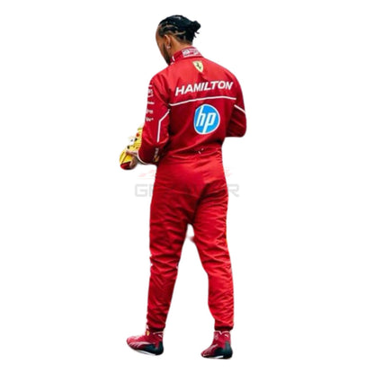 Lewis Hamilton wearing a red 2025 Ferrari F1 racing suit with 'Hamilton' and 'hp' logos - GPX WEAR