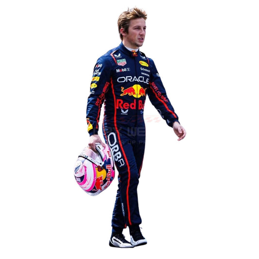 Liam Lawson wearing a navy blue 2025 Red Bull F1 racing suit, holding a helmet - GPX WEAR