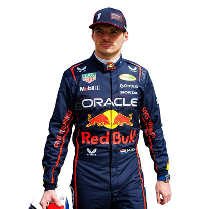 Max Verstappen wearing a navy blue 2025 Red Bull F1 racing suit with various sponsor logos - GPX WEAR
