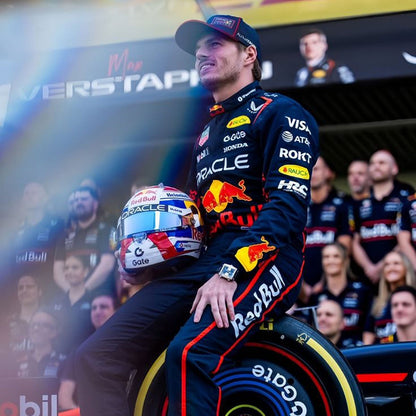 Max Verstappen wearing a navy blue 2025 Red Bull F1 racing suit - GPX WEAR
