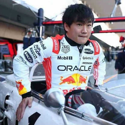 2025 Yuki Tsunoda Setting in a car wearing Japanese GP F1 Racing Suit Team Red Bull
