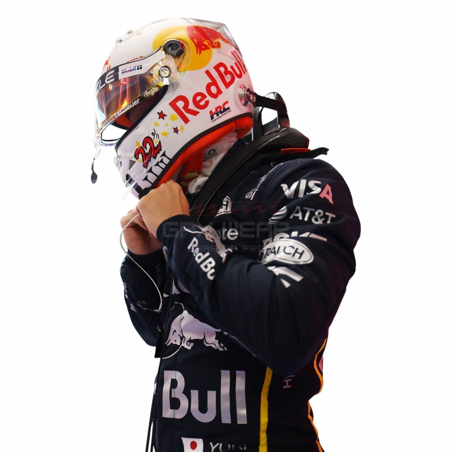 Yuki Tsunoda wearing a black 2025 Red Bull Las Vegas GP F1 racing suit and helmet with various sponsor logos - GPX WEAR