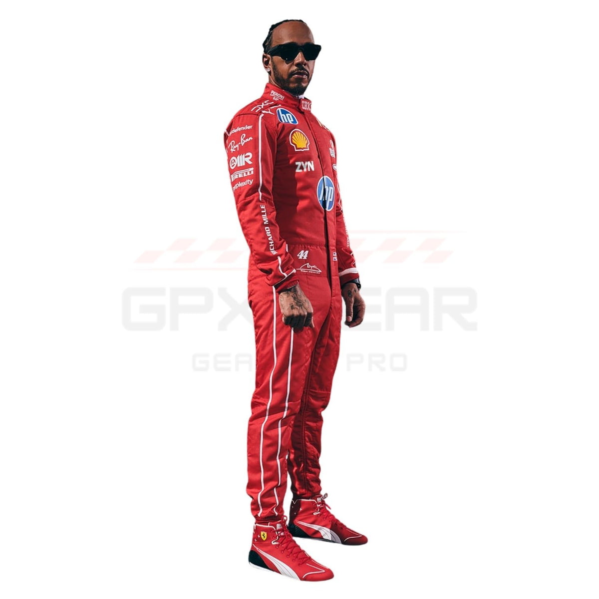 A Lewis Hamilton wearing a red Ferrari racing suit with sponsor logos, matching red Ferrari shoes, and black sunglasses, standing against a plain white background.